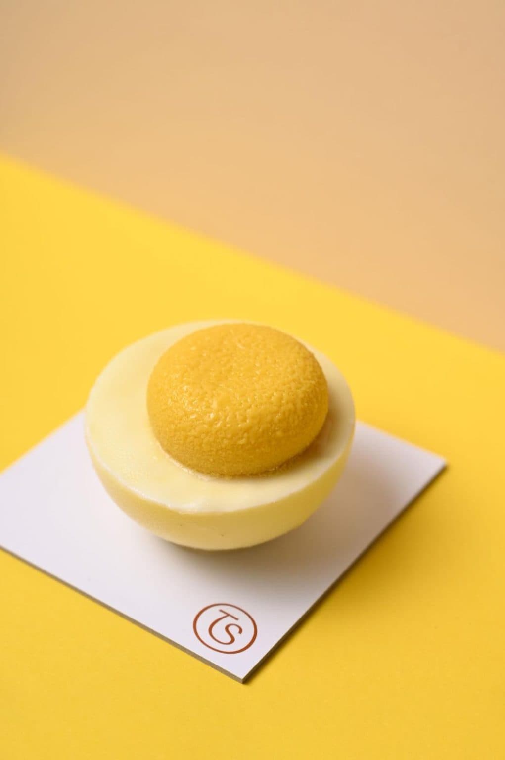 Artisan dessert featuring pistachio and white chocolate